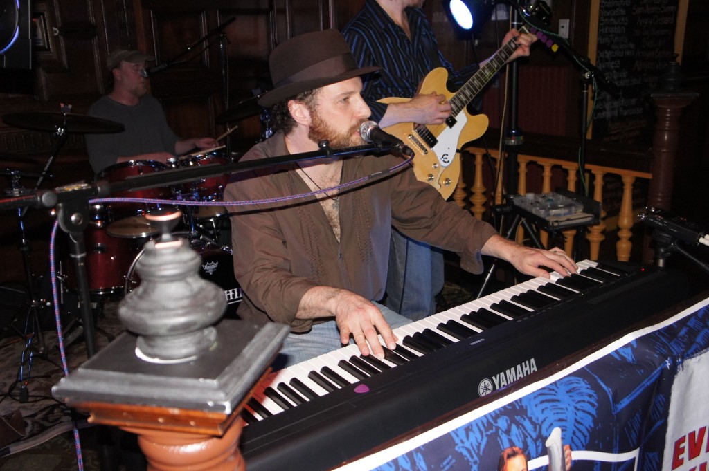 Craig Herlihy performing live on keyboards with rock band Yoke Shire